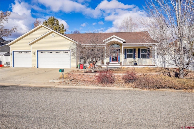 ranch-style home featuring a porch and a garage