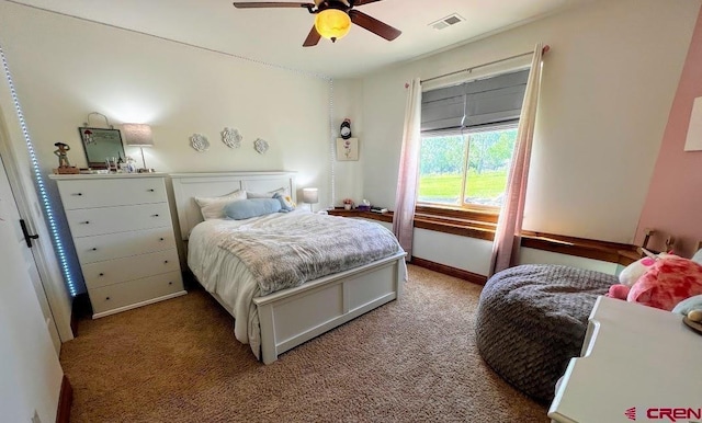 carpeted bedroom with ceiling fan