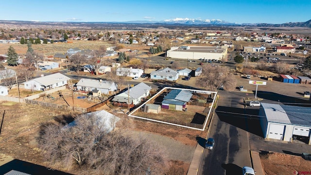 drone / aerial view featuring a mountain view