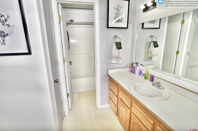 bathroom featuring vanity and walk in shower