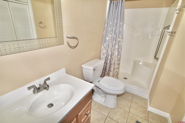 bathroom featuring a shower with shower curtain, tile patterned flooring, vanity, and toilet