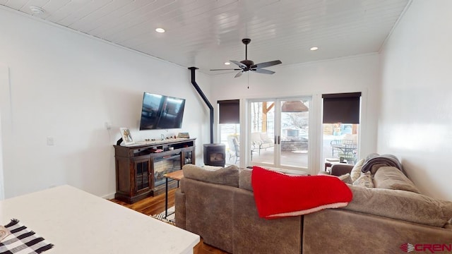 living room with ceiling fan and wood-type flooring