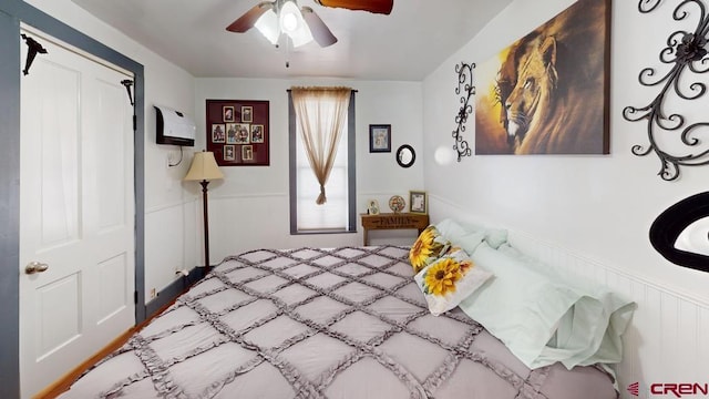 bedroom featuring ceiling fan