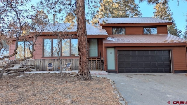 view of front of property with a garage