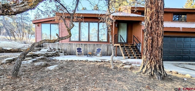 view of front of home featuring a garage