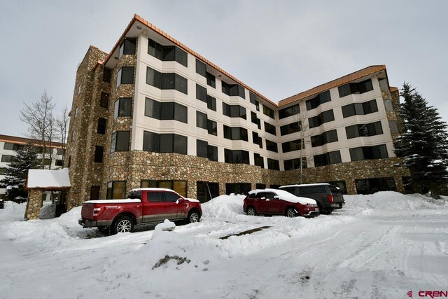 view of snow covered building