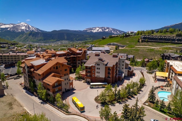 drone / aerial view featuring a mountain view