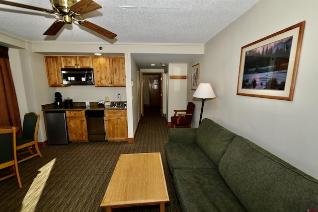 carpeted living room featuring a textured ceiling, ceiling fan, and sink