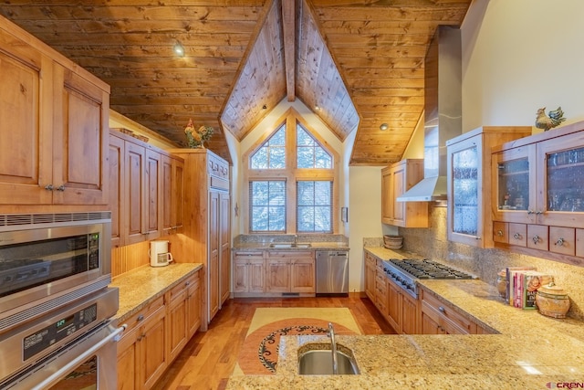 kitchen featuring stainless steel appliances, wooden ceiling, vaulted ceiling, and light stone countertops