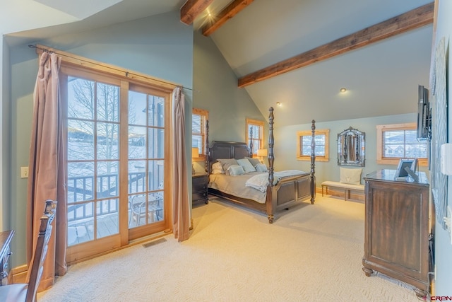 carpeted bedroom with high vaulted ceiling and beam ceiling