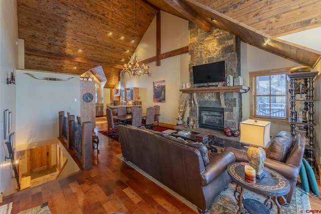 living room featuring beam ceiling, a stone fireplace, high vaulted ceiling, and dark hardwood / wood-style floors