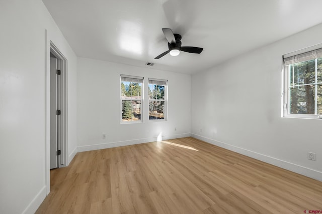 interior space with ceiling fan and light hardwood / wood-style flooring