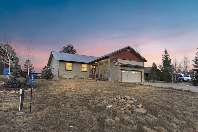 single story home featuring a garage