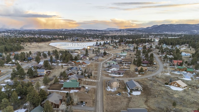 aerial view at dusk with a mountain view