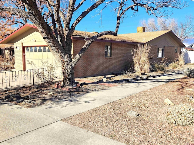 view of home's exterior with a garage