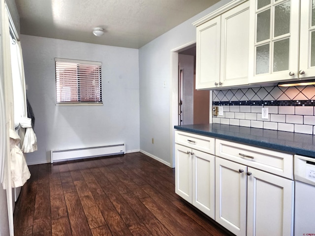 kitchen with white cabinetry, a baseboard heating unit, decorative backsplash, dark wood-type flooring, and dishwasher