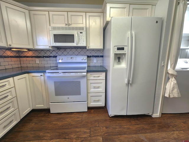 kitchen featuring washer / clothes dryer, decorative backsplash, dark hardwood / wood-style floors, and white appliances