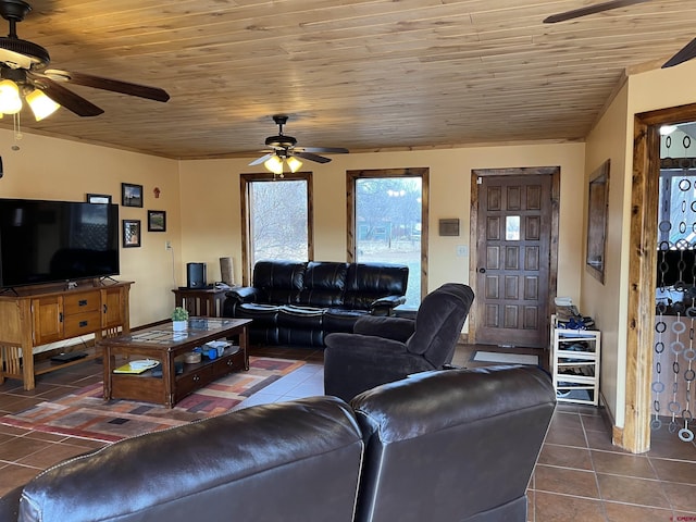 tiled living room with ceiling fan and wooden ceiling