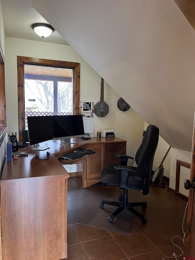 tiled office space with lofted ceiling