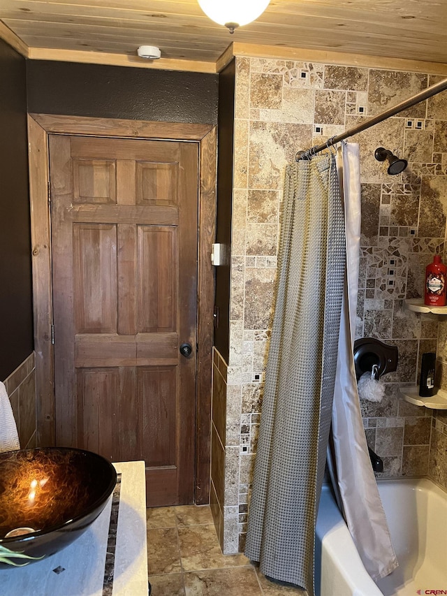 bathroom featuring shower / bathtub combination with curtain and wooden ceiling