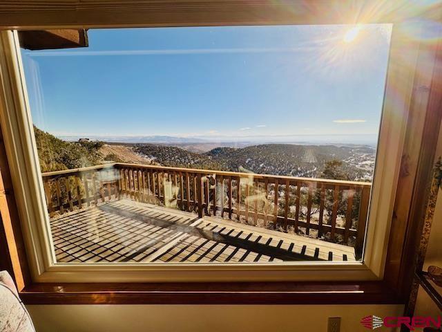 balcony featuring a mountain view