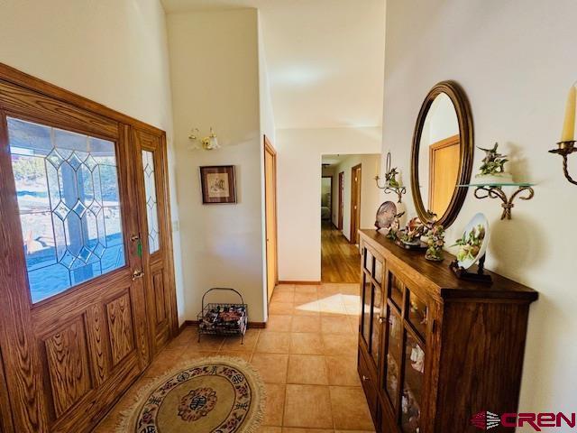 view of tiled foyer entrance