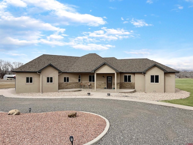 view of front facade featuring a patio area