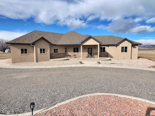 view of front of home featuring a patio