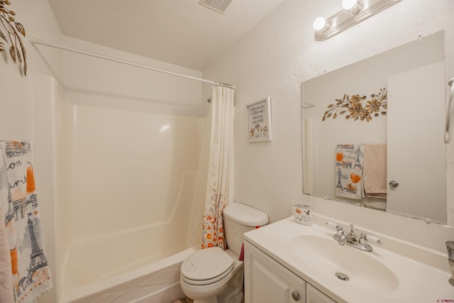 full bathroom featuring toilet, vanity, and shower / bath combination with curtain