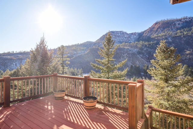 wooden terrace with a mountain view