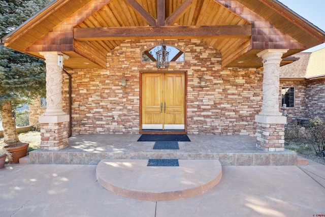 entrance to property featuring a porch