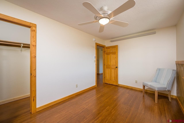 unfurnished room with ceiling fan and hardwood / wood-style flooring