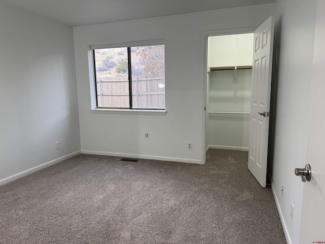 unfurnished bedroom with carpet flooring