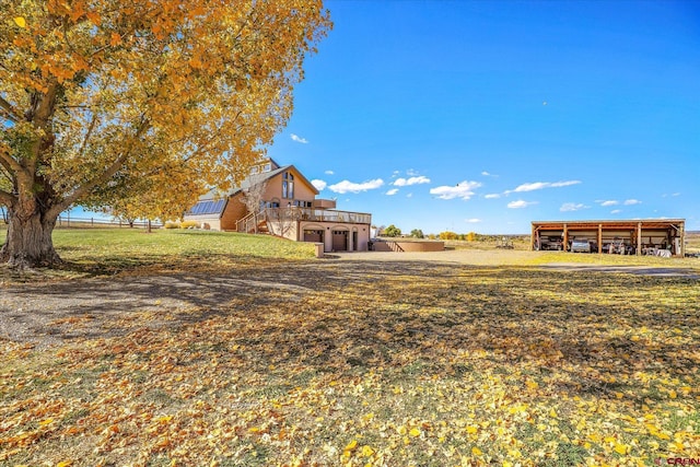 view of yard featuring a deck