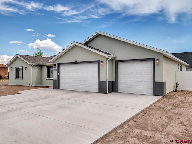 ranch-style home with a garage