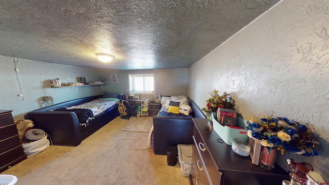 carpeted bedroom featuring a textured ceiling