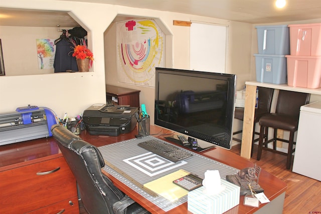 office space with hardwood / wood-style flooring