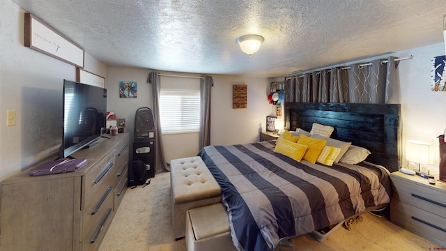 carpeted bedroom with a textured ceiling