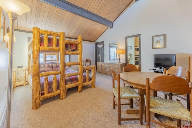 dining room featuring carpet, wood ceiling, beamed ceiling, and high vaulted ceiling