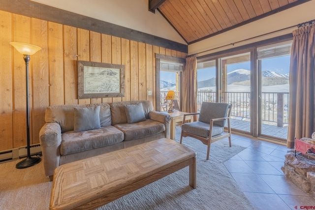 tiled living room featuring wood ceiling, a mountain view, wooden walls, high vaulted ceiling, and beam ceiling