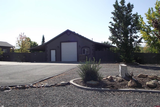 exterior space featuring a garage