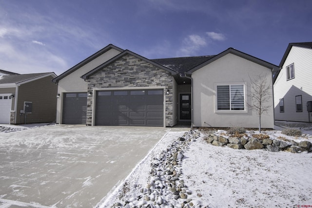 ranch-style house with stone siding, driveway, an attached garage, and stucco siding