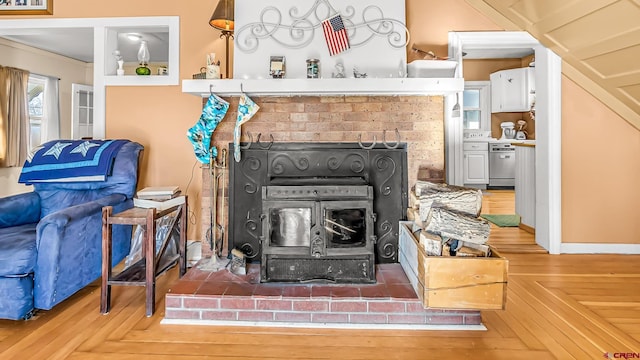 details featuring parquet floors, a wood stove, and range