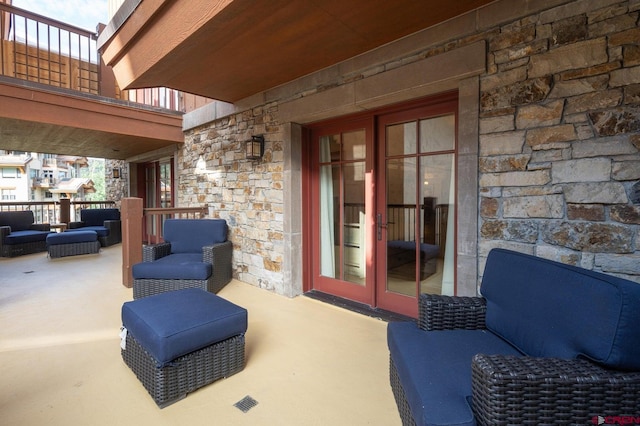 view of patio with french doors and an outdoor hangout area