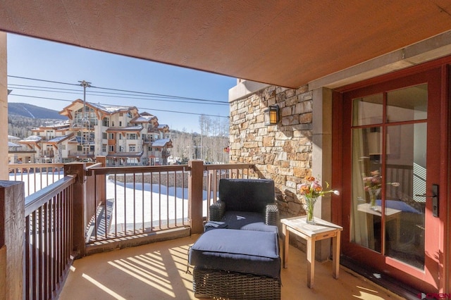 balcony featuring a mountain view