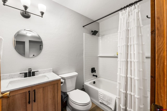 full bathroom featuring toilet, vanity, and shower / bathtub combination with curtain