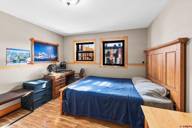 bedroom with light hardwood / wood-style flooring