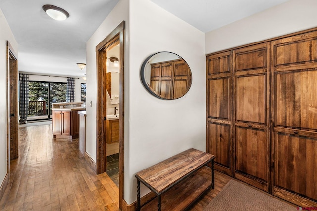 hallway featuring light wood-type flooring