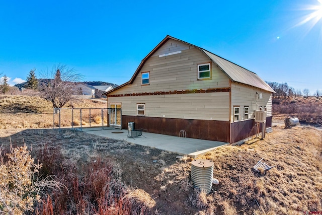 view of home's exterior featuring a patio area