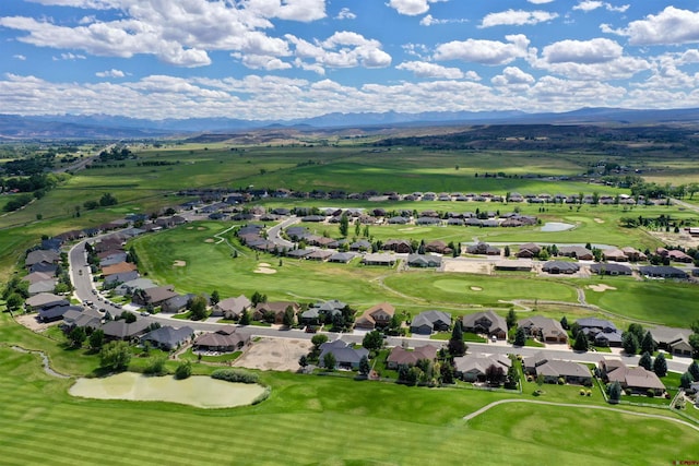 drone / aerial view featuring a mountain view